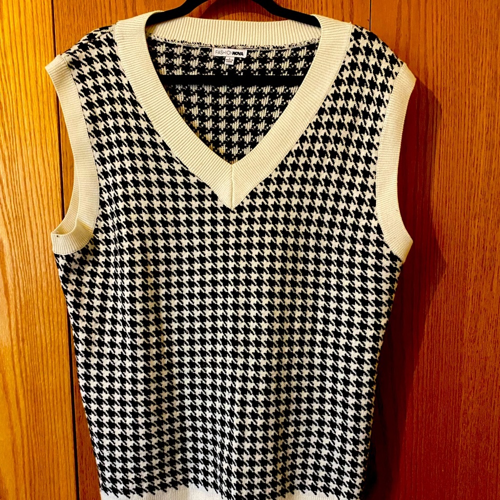 Black and cream Sweater vest.